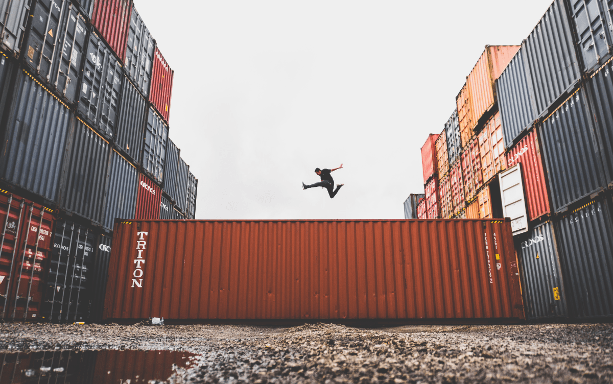 A photo of a man jumping very high, suggesting how to TRANSFORM RESISTANCE and ANXIETY through art making.
